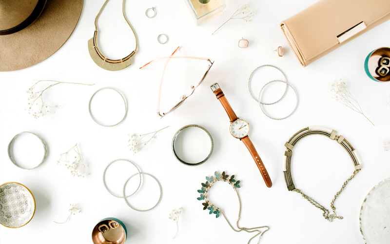 Jewellery and accessories on white table