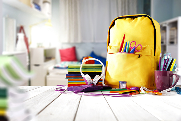 School supplies on wooden table